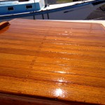 3 coats of Cetol Natural Teak, 2 coats of Cetol Gloss to finish. Looks beautiful if you ask me.