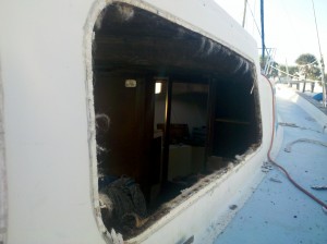 Window removed. Old headliner staples and mess left in the core.