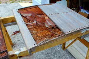 However, the real gremlin was revealed when I removed the slats. Underneath the slats and between the formica bottom was what appeared to be a piece of plywood that had completely rotten away. The leak I saw had done some major damage to the plywood supporting the hatch.